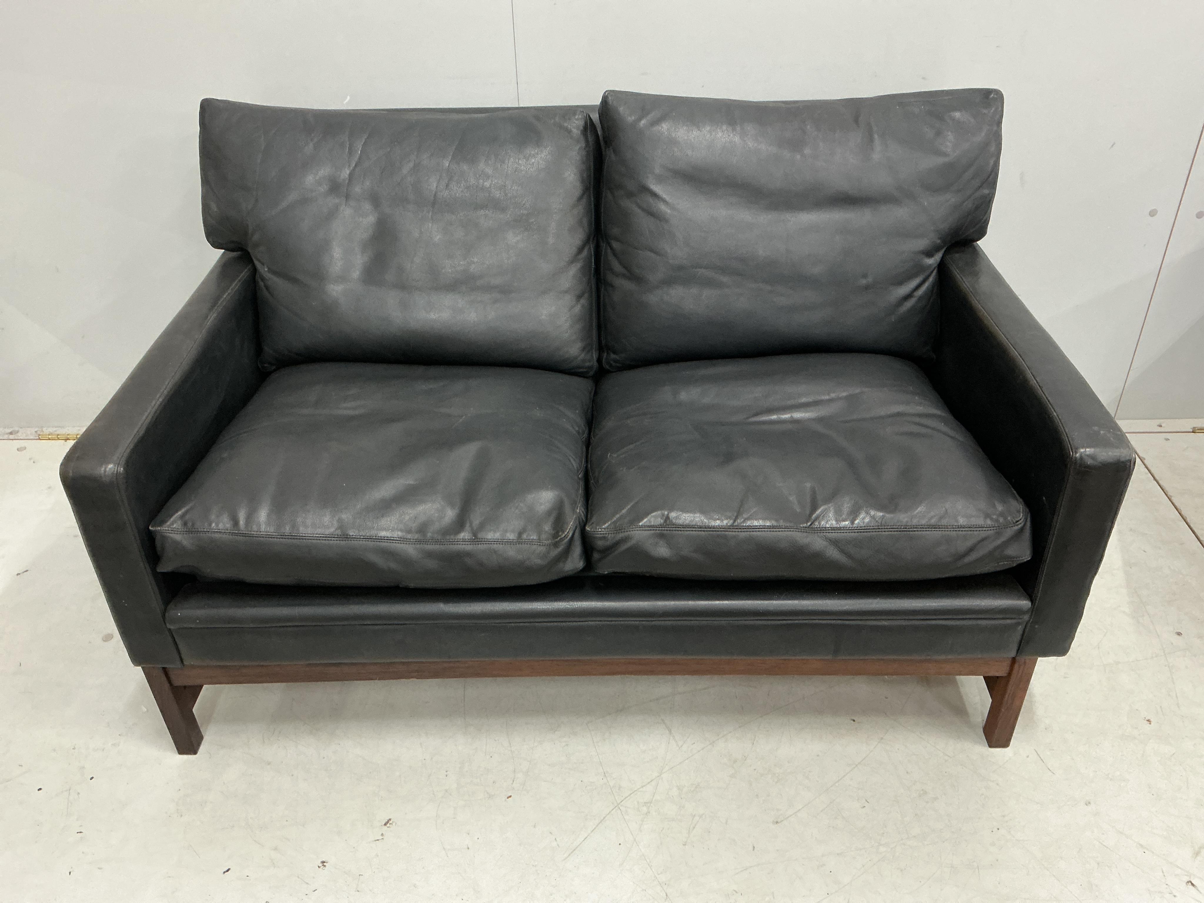 A Swedish two seat sofa and armchair